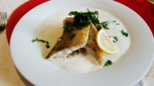 gebratener Fisch zum Dinner im Hotel Caroline am Achensee