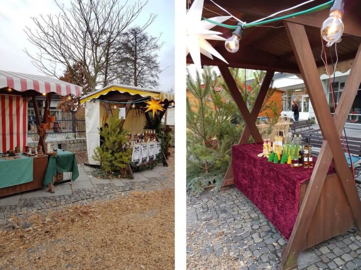 Buden auf dem Weihnachtsmarkt im Großen Spreewaldhafen in Lübbenau